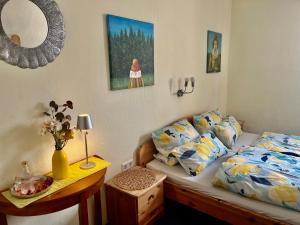 Postel nebo postele na pokoji v ubytování Pension Petersohn (ehem. Zur Heimat)