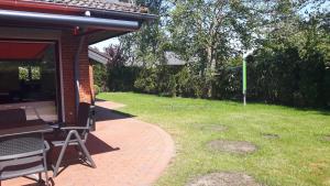 Κήπος έξω από το Ferienhaus Deichblick_SPO +37 φωτογραφίες