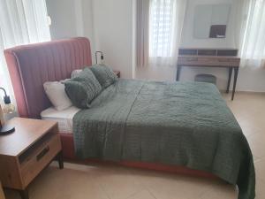 Postel nebo postele na pokoji v ubytování Mesan Golfing Villa