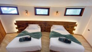 Postel nebo postele na pokoji v ubytování Bungalow Allende Famara con piscina privada y AC