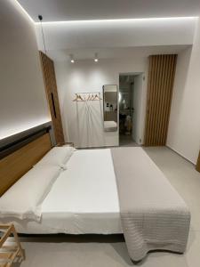 Posteľ alebo postele v izbe v ubytovaní Le Dimore Degli Archi Rooms & Suite Catania