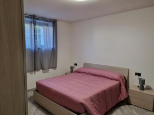 Postel nebo postele na pokoji v ubytování Hotel Rezia