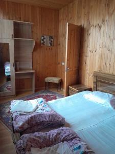 Postel nebo postele na pokoji v ubytování Guest House Guliada