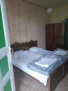 Postel nebo postele na pokoji v ubytování Guest House Guliada