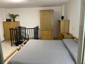 Voodi või voodid majutusasutuse B&B Room Code 2 toas