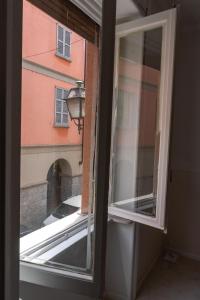 Fotografie z fotogalerie ubytování PALAZZO NOVECENTO Centro Storico v destinaci Lecco