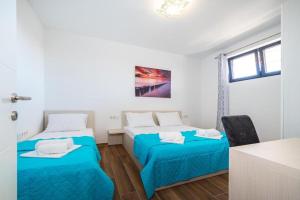 Postel nebo postele na pokoji v ubytování Villa Laura View