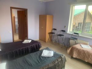 Posteľ alebo postele v izbe v ubytovaní Green Hotel