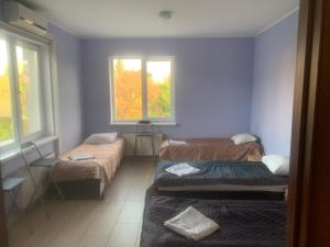 Posteľ alebo postele v izbe v ubytovaní Green Hotel