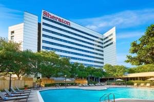 a rendering of aether convention hotel with a swimming pool at Sheraton North Houston at George Bush Intercontinental in Houston