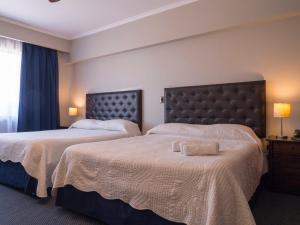 Letto o letti in una camera di Hotel Econohotel
