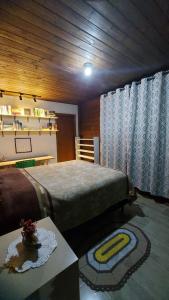 Cama ou camas em um quarto em Sítio Ameixa do Campo