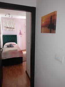 Postel nebo postele na pokoji v ubytování Alnea