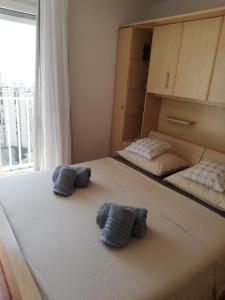 Postel nebo postele na pokoji v ubytování Alnea