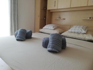 Postel nebo postele na pokoji v ubytování Alnea
