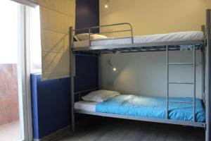 Krevet ili kreveti u jedinici u okviru objekta Joey's Hostel Delhi - 20 mins from Railway Station