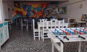 A restaurant or other place to eat at Che Neco