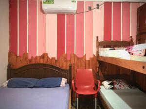 Кровать или кровати в номере Hosteria NAMAJU