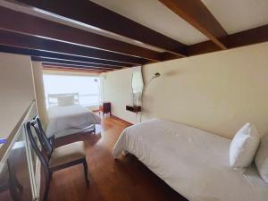 Katil atau katil-katil dalam bilik di Atrium Miraflores Hotel