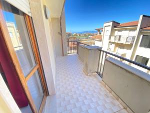 En balkon eller terrasse på Attico sul Mare