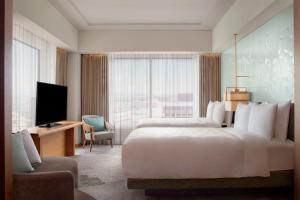 JW Marriott Hotel Nara客房内的一张或多张床位