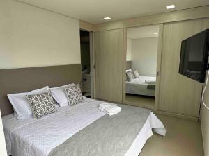 Ένα ή περισσότερα κρεβάτια σε δωμάτιο στο Loft - mejor vista en el Poblado 2312