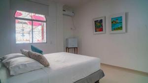 Postel nebo postele na pokoji v ubytování Hotel Boutique Casa Umiña