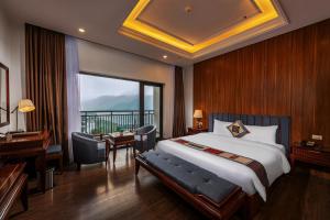 Postel nebo postele na pokoji v ubytování Bamboo Sapa Hotel