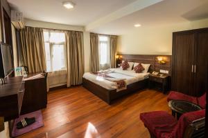 Ένα ή περισσότερα κρεβάτια σε δωμάτιο στο Hotel Yambu kathmandu