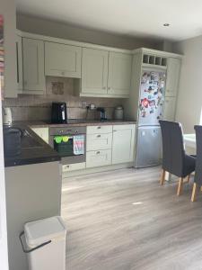 Kuchyň nebo kuchyňský kout v ubytování Cosy home
