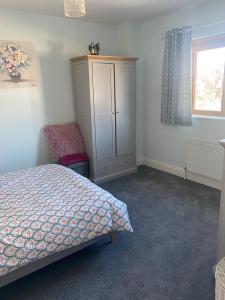 Postel nebo postele na pokoji v ubytování Cosy home