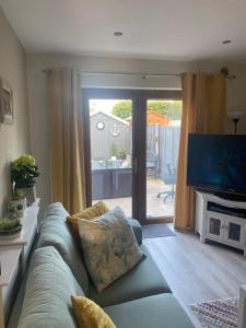 TV a/nebo společenská místnost v ubytování Cosy home