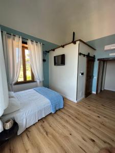 A bed or beds in a room at Villa Mazza al Vesuvio