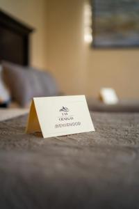 a white card sitting on top of a table at Casas de Campo Las Ciénegas in Calvillo