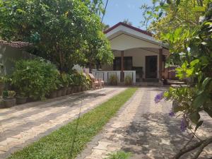 Zahrada ubytování Red Rose Villa Mirissa