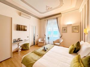 TV a/nebo společenská místnost v ubytování Hotel Jolanda