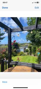 a picture of a view of a garden with a bench at Stargazy Garden in Hayle