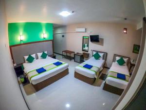 Uma cama ou camas num quarto em O2 Ella