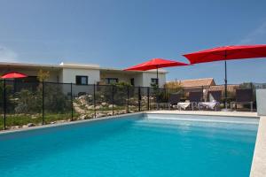 Bazén v ubytovaní appart Libeccio swimming pool bbq alebo v jeho blízkosti