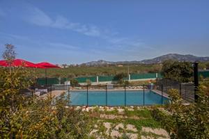 Bazén v ubytovaní appart Libeccio swimming pool bbq alebo v jeho blízkosti
