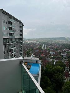 a view of a city from a building at Ilsham Guest House @ Seroja Hills BBST Sepang in Sepang