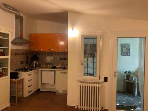 Cucina o angolo cottura di B&B Uva Fragola