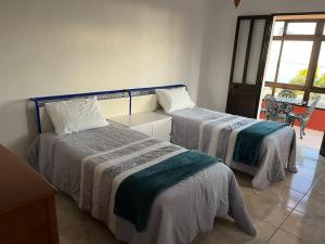 Postel nebo postele na pokoji v ubytování Casa da Isilda ,three bedrooms
