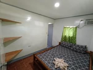 Postel nebo postele na pokoji v ubytování Ander Divers Garden Resort