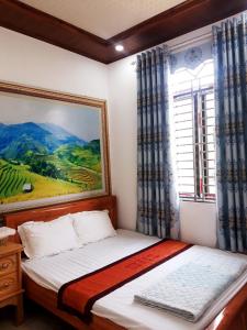 Giường trong phòng chung tại Hotel Thien An