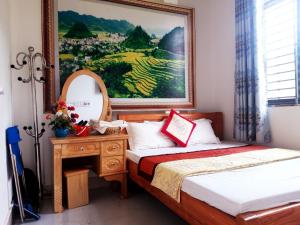Katil atau katil-katil dalam bilik di Hotel Thien An +127 gambar