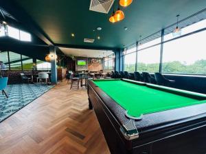 a pool table in a gaming room with a pool table at Caravan on the Devon\Cornwall border in Stratton