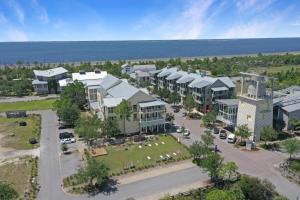 an aerial view of a resort near the ocean at Beach Haven at WindMark by Pristine Properties Vacation Rentals in Highland View