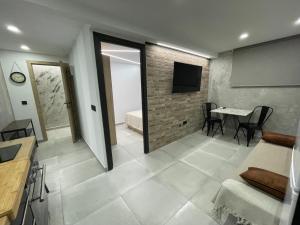 Telewizja i/lub zestaw kina domowego w obiekcie Benidorm JL 1 y 2