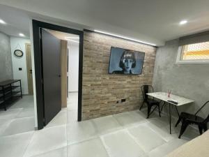 Telewizja i/lub zestaw kina domowego w obiekcie Benidorm JL 1 y 2